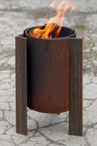Tufa fire pit UK with swirling flames modern contemporary steel unusual sculptural see gallery