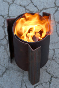 Tufa close up of a modern, contemporary and unique fire pit, cleaner burning.