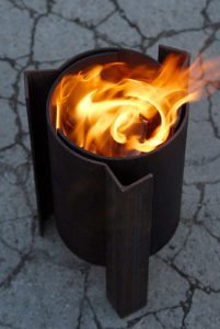 Tufa close up of a modern, contemporary and unique fire pit, cleaner burning.