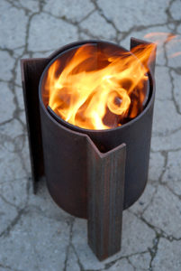 Tufa close up of a modern, contemporary and unique fire pit, cleaner burning.