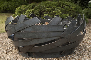 ERTA modern firepit in woven steel, each one is a unique work of art