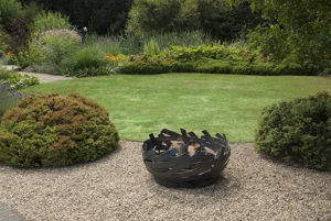 ERTA a unique fire pit in woven steel, each one is an individual work of art and hand made in Britain.